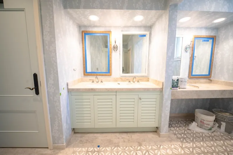 Card Sound Clubhouse bathroom vanity mirrors and textured wallcovering, installed by Wallcovering Pro