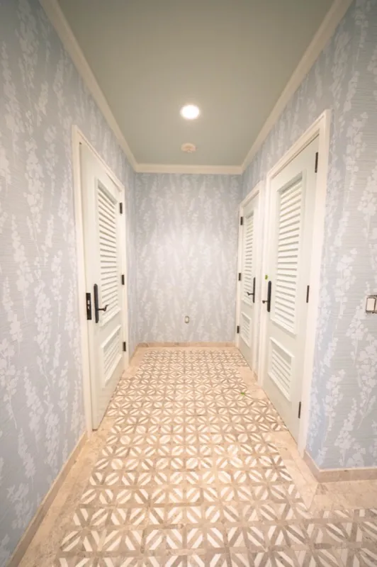 Card Sound Clubhouse hallway with ceiling light and patterned tile