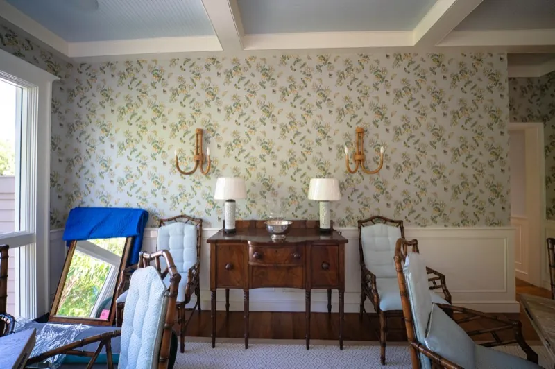 Card Sound Clubhouse floral wallpaper detail with sconces and sideboard, installed by Wallcovering Pro