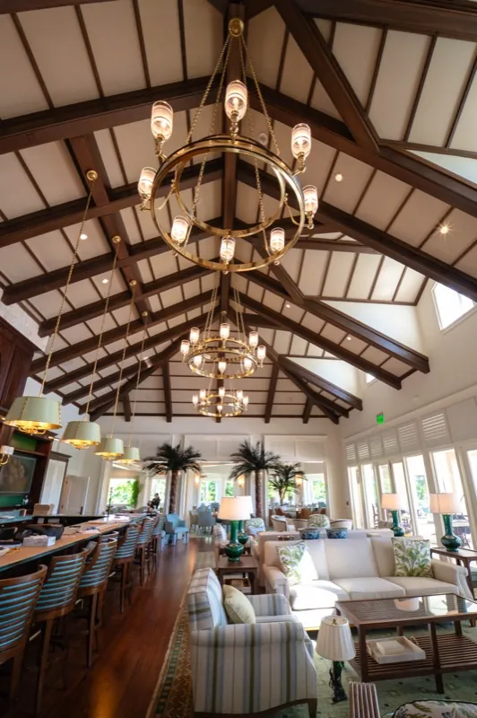 Card Sound Clubhouse grand lounge with a chandelier cluster and bar