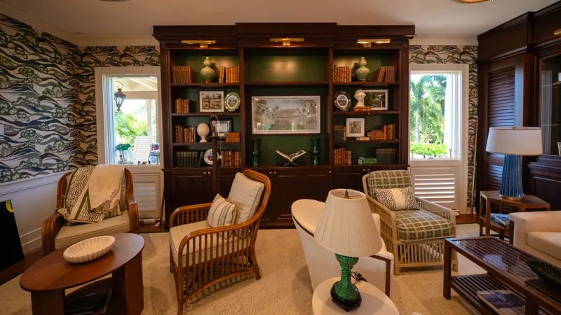 Card Sound Clubhouse library den with dark wood built-ins