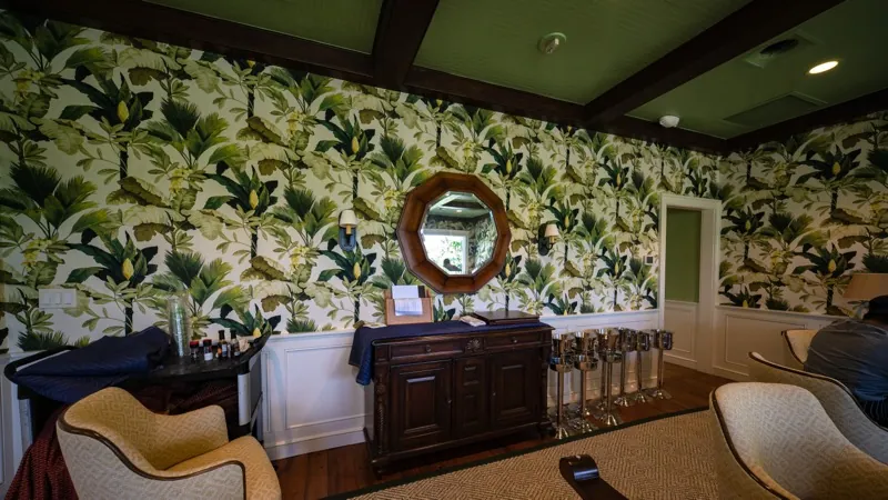 Card Sound Clubhouse powder room with botanical mural wallcovering, installed by Wallcovering Pro